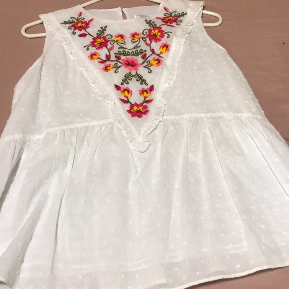 White with flower blouse